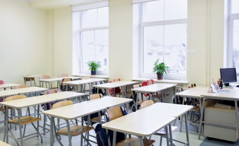 Elementary school classroom with desks